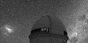 An observatory in Chile illuminated by stars
