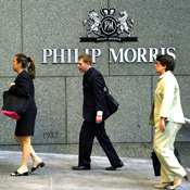 Pedestrians enter Phillips Morris headquarters 