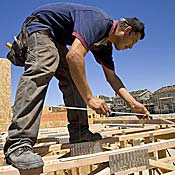Construction workers build homes in San Ramon, CA 