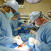 doctors perform surgery 