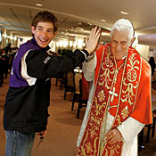 High-fiving pope cutout 