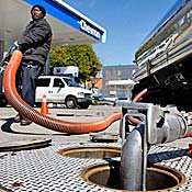 Gas truck fills underground tank 