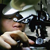 Worker in China shoe factory 