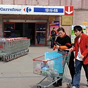 Customers leave Carrefour Wuning Store in Shanghai 