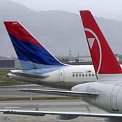 Tails of Delta and Northwest planes 