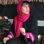 Saudi woman holds prayer beads 