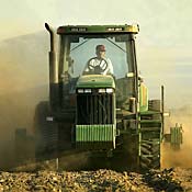 Farmer plows field near Arvin, Calif 