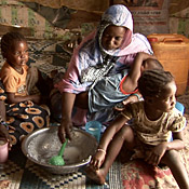 Family in Mauritania eats pudding 