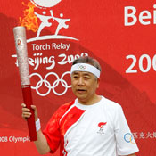 South Korean President carrying Olympic torch 