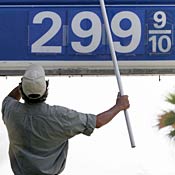Gas station attendant adjusts price in Sept. 2005 