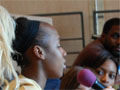 A young woman speaks at MPR's UBS Forum