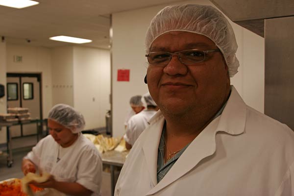 
                La Indiana Tamales owner Raul Ramos says the rising cost of his ingredients has forced him to lay off a third of his staff.
                                    (Sam Eaton / Marketplace)
                                