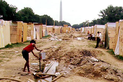 
                    Resurrection City, June 1968
                                            (Ollie Atkins Photograph Collection, Special Collections & Archives, George Mason University Libraries)
                                        