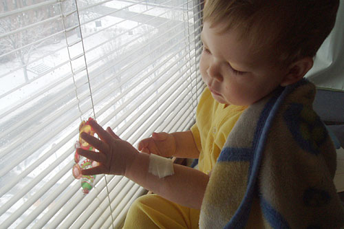 
                    Eliot McGinley in the hospital after another round of chemotherapy.
                                            (Sara McGinley)
                                        