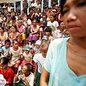 Burmese people wait for food 