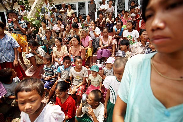 
                Burmese people wait for food at a temporary camp on May 9 in Kyacek Tan, about 30 miles south of the capital of Yangon.
                                    (Chumsak Kanoknan/Getty Images)
                                