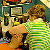 Lilian Aguirre cuts hair at International Salon