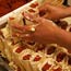 Hands making tamales