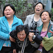 Grieving Chinese mother 