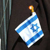 An Israeli settler with national flag 
