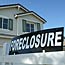 Foreclosure sign on house for sale