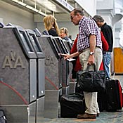 Passenger checks in at American Airlines 