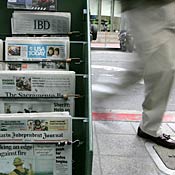 Newspapers displayed on stand in San Francisco 