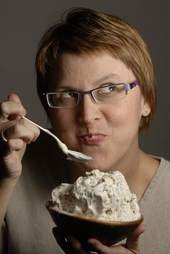 
                    It's amazing that Karen Roberts still does after trying to consume a full gallon of mint chocolate chip in one sitting.
                                            (Thad Allender/Lawrence Journal-World Photo)
                                        