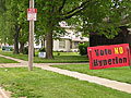 Competing yard signs