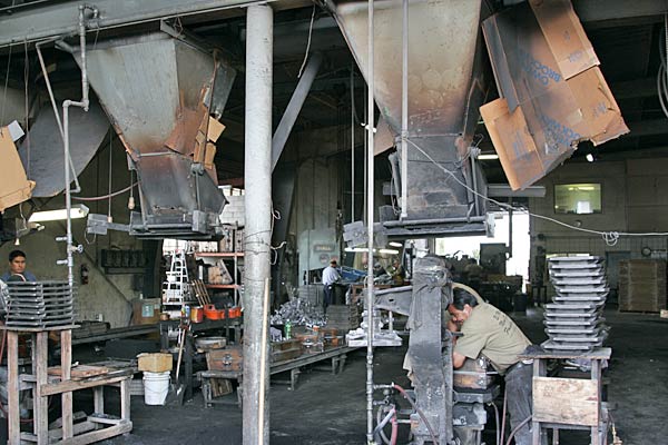 
                A cap on greenhouse gas emissions proposed in the Lieberman-Warner bill in the Senate would trickle down to businesses like this aluminum foundry in City of Industry, Calif., in the form of higher energy bills and shipping costs. Despite that fact, owner Eric Williamson supports it.
                                    (Sam Eaton / Marketplace)
                                