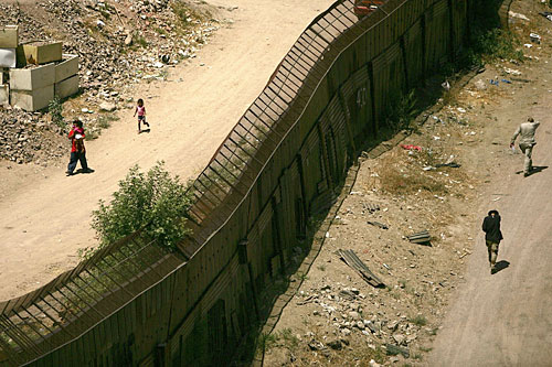 
                    A fence along the U.S.-Mexican border in Nogales, Ariz.
                                            (Spencer Platt/Getty Images)
                                        