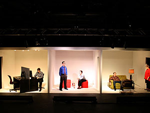 "SadGrrl13" takes place in three boxes: a TV newsroom, a living room and an empty box.