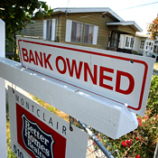 Sign outside of a house under foreclosure 