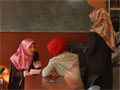 Women read from the Koran