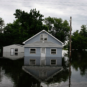 A house is surrounded by the Mississippi River 