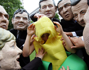 Anti-G8 activists wearing the masks of the G8 leaders perform at a rally in Sapporo, Hokkaido
Japan -- July 7, 2008