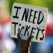 man looking for tickets 
