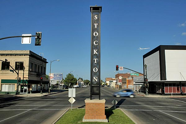 
                A sign in a deserted section of downtown Stockton, Calif.
                                    (Justin Sullivan/Getty Images)
                                