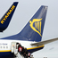 Passengers board a Ryanair Boeing.