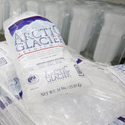Bags of ice in a freezer 