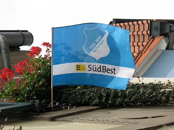 
                A flag for the local soccer team flies from a home in Hoffenheim, Germany.
                                    (Brett Neely)
                                
