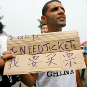 A tourist hunts for Olympic tickets in Beijing 