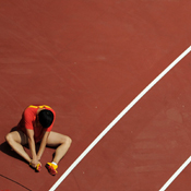 Chinese hurdler Liu Xiang down after ankle injury 