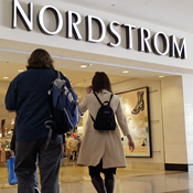 Shoppers enter a Nordstrom store 