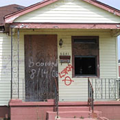 A New Orleans house still boarded up. 