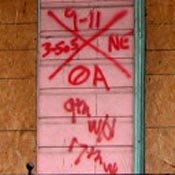 Pink house with X 