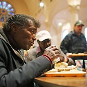 Mark Stephen Moore eats free lunch. 