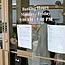 A man locks a 1st National Bank of Nevada branch