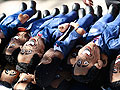 A stack of Obama dolls ready for sale