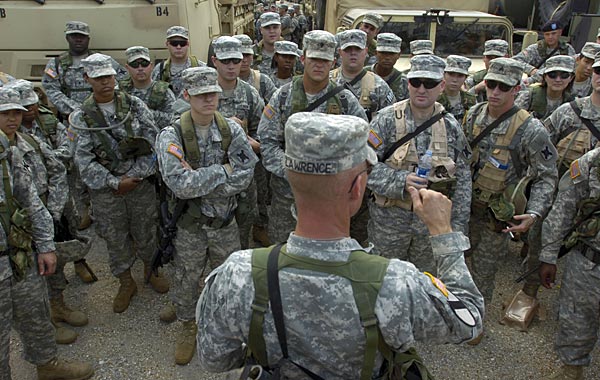
                Some of the 1,500 Louisiana National Guard troops who have been sent to New Orleans get instructions after arriving at the convention center during preparations for Tropical Storm Gustav.
                                    (Stephen Morton/Getty Images)
                                